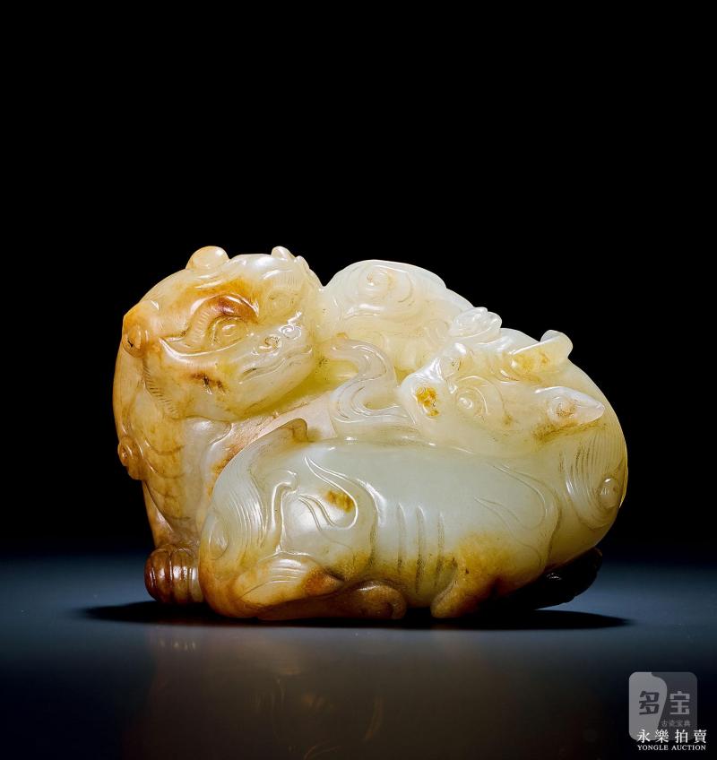 明 白玉沁色双兽